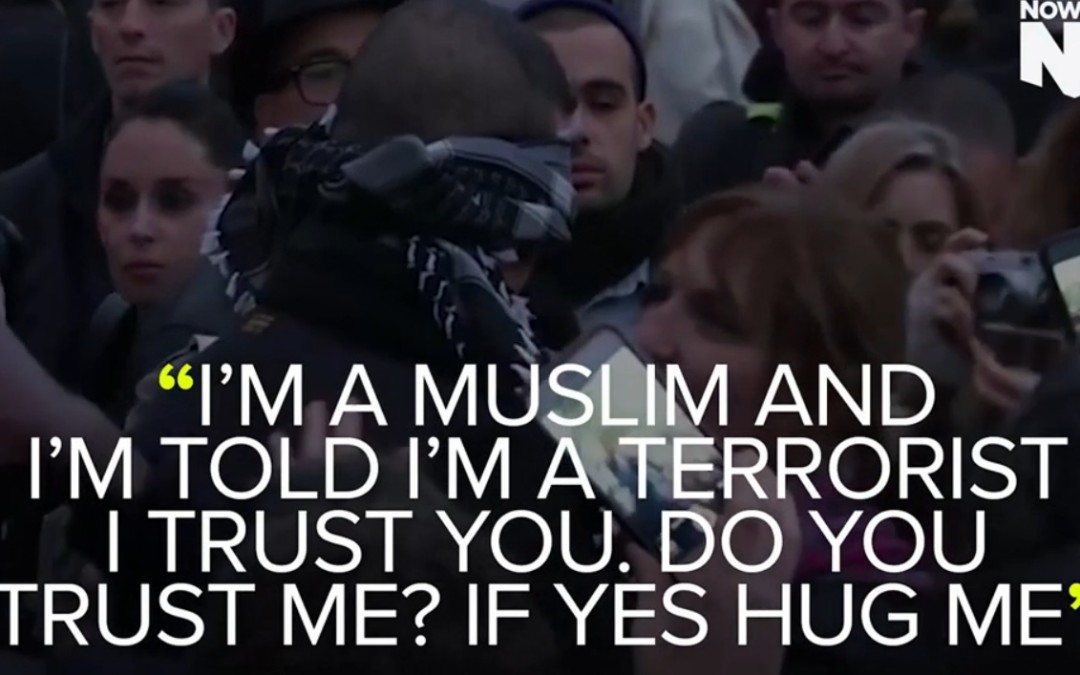 Blindfolded Muslim Man Offers Hugs in Paris